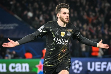 Khvicha Kvaratskelia shows his delight after scoring.