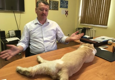 Igor Strelkov with his cat, Grumpy