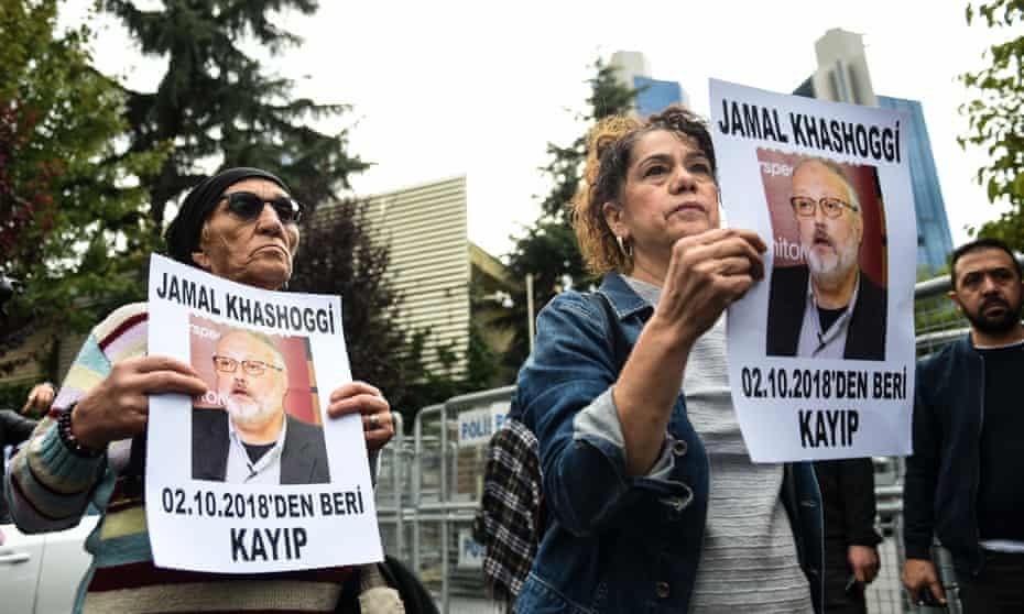 Demonstrators hold portraits of the missing journalist Jamal Khashoggi in Istanbul.