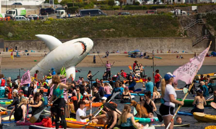 Making waves: an inflatable shark warned against the issue of sea life consuming discarded plastic.
