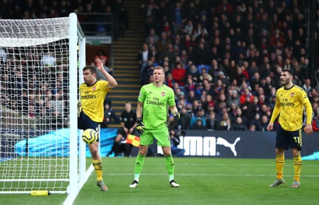 Sokratis clears the ball off the goal line.