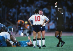 Paul Gascoigne is booked for fouling Thomas Berthold in the Stadio delle Alpi.