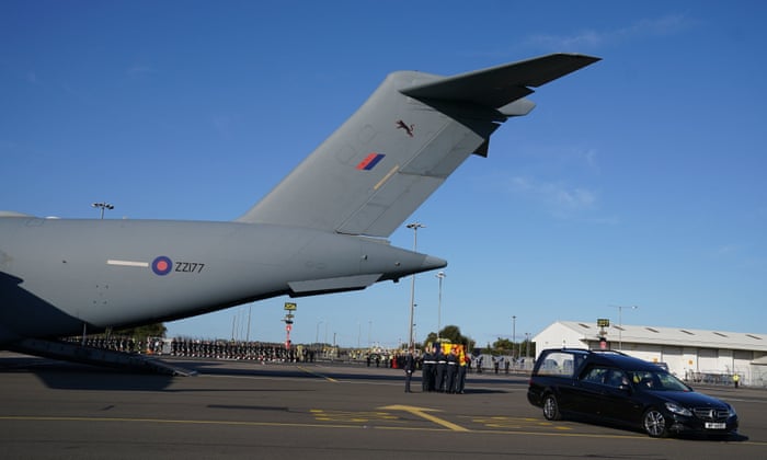 The coffin of Queen Elizabeth II arrives at Edinburgh Airport, Scotland.