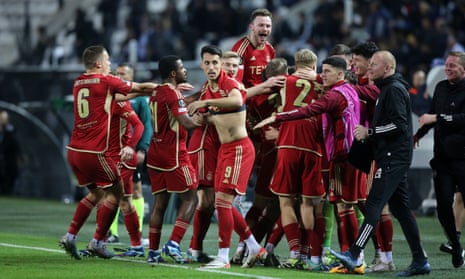 Aberdeen players celebrate scoring a goal to make it 2-2 against PAOK.