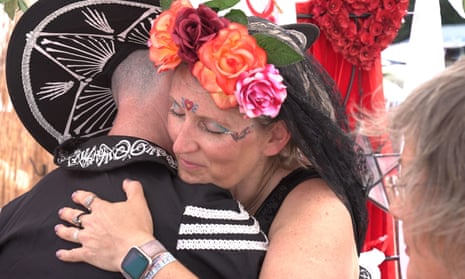 Glastonbury Festival 2023Stuart Beauchamp, 49, a finance director, and his wife, Anna Stevens, 44, who have been married for four weeks, seal their marriage at a handfasting ceremony, which is an ancient practice that sees couples tie their wrists together with cloth to declare their commitment to each other, at the Glastonbury Festival at Worthy Farm in Somerset. Picture date: Friday June 23, 2023. PA Photo. See PA story SHOWBIZ Glastonbury Wedding. Photo credit should read: Tom Leese/PA Wire