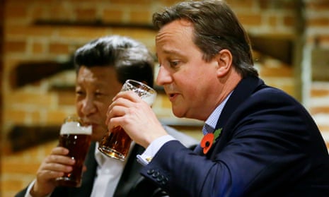 The then-PM, David Cameron, shares a pint with the Chinese president, Xi Jinping, in 2015. 