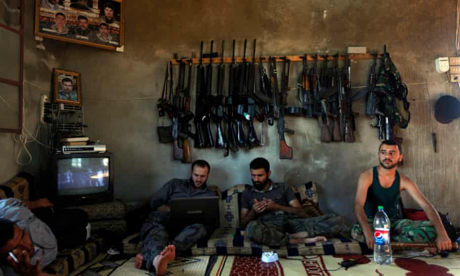 Free Syrian Army fighters on the outskirts of Aleppo, Syria, in 2012