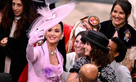 Katy Perry taking selfie photos with fellow guests at Westminster Abbey
