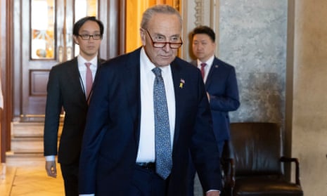 US Senate majority leader Chuck Schumer leaves the Senate chamber after a Senate vote on Capitol Hill on Thursday.