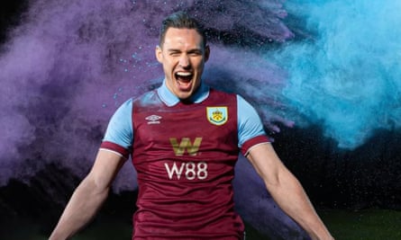 Conor Roberts in Burnley’s new kit with colourful background