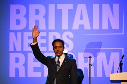 Zia Yusuf in front of Britain Needs Reform sign