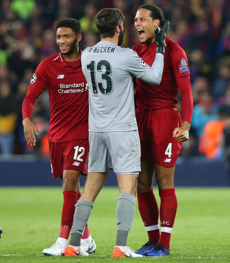 Virgil van Dijk and Alisson celebrate beating Barcelona