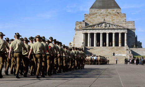 Defence personnel march to the Shrine of Remembrance to honour soldiers who have died in the line of duty on Anzac Day in Melbourne