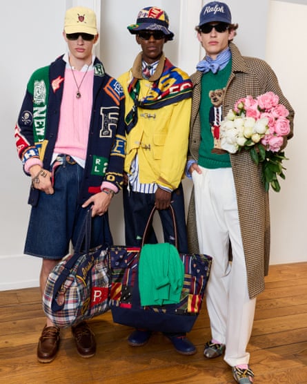 Three models wearing outfits from the Ralph Lauren show