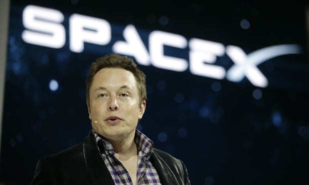 Elon Musk introducing the SpaceX Dragon V2 spaceship at the SpaceX headquarters in Hawthorne, California.