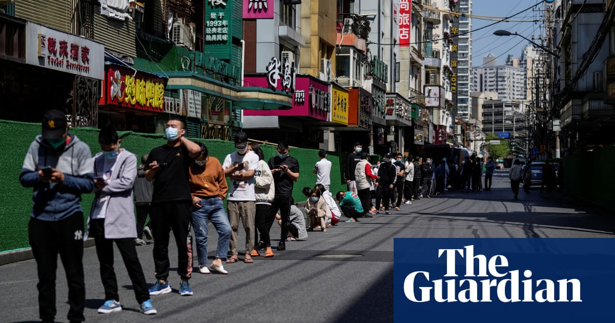 Shanghai prepares to ease Covid lockdown as factories reopen - The Guardian
