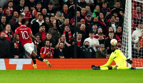 Francis Uzoho blocks an effort from Rashford.