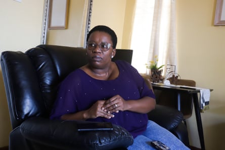 Phenyo Tanka on her couch in her living room