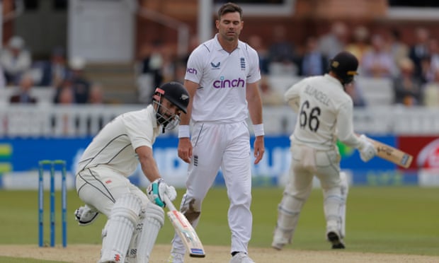 Jimmy Anderson (centre) shows frustration as Daryl Mitchell (left) and Tom Blundell rack up more runs on day two.