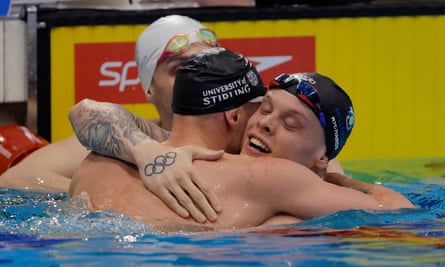 Matt Richards (right) embraces runner-up Duncan Scott after winning the men’s 200m freestyle final at the British Championships in April
