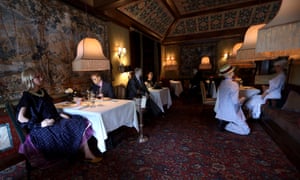 Mannequins costumed in 1940s era clothing are seated in the dining area of the Inn at Little Washington, a Michelin three star restaurant in the Virginia countryside, in Rappahannock County 14 May 2020 in Washington, Virginia.