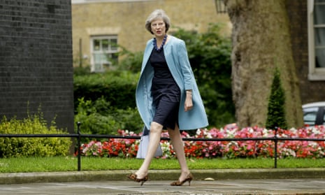 Home secretary Theresa May arrives for a cabinet meeting at Downing Street.