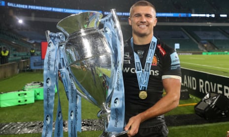 Henry Slade shows off the Premiership trophy following Exeter’s triumph in the final against Wasps on Saturday.