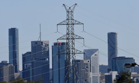 A high voltage electricity transmission tower is seen in the foreground of the Brisbane CBD skyline