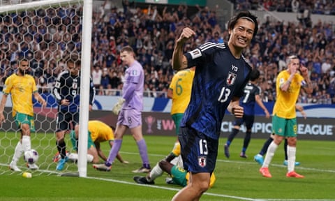 Keito Nakamura of Japan celebrates Cameron Burgess’s own goal for Australia in Saitama.