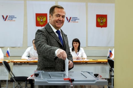 Dmitry Medvedev casts his ballot at a polling station outside Moscow.