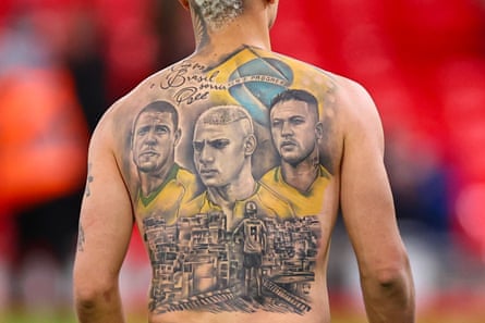 Richarlison’s back tattoo shows himself, Neymar and Ronaldo above a favela cityscape
