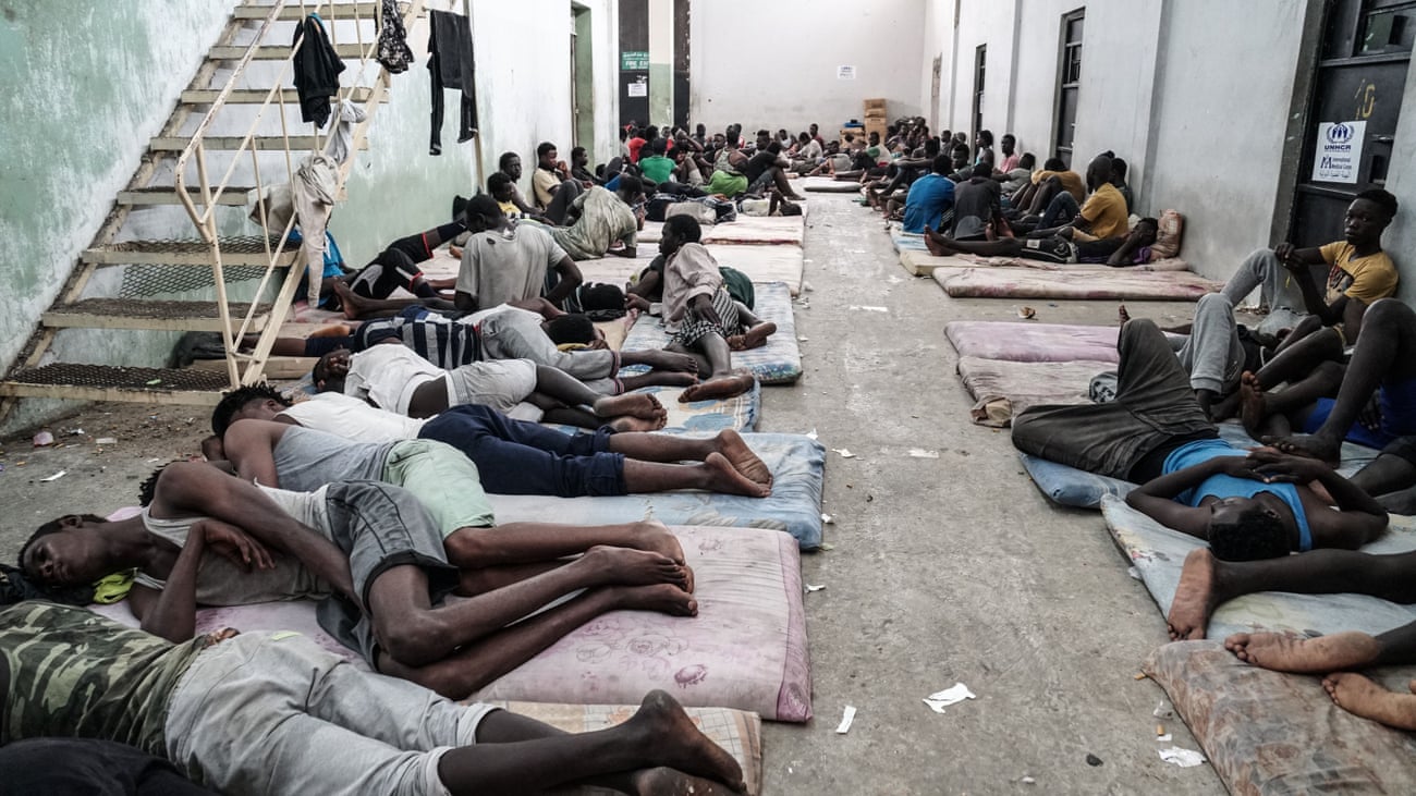 Refugees and migrants at a detention centre in Zawiyah, Libya, in 2017