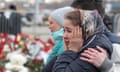 People mourn outside Crocus City Hall after a terrorist attack in Krasnogorsk, near Moscow.