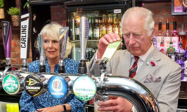‘Essential second in our historical past’: Welsh valleys city marks Queen’s funeral | Queen Elizabeth II 2 Charles pulls a pint at the Lion pub during a visit to Treorchy high street in on 5 July.