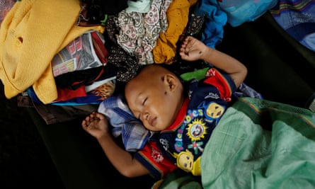 A child rests at an evacuation centre at Labuhan after a tsunami hit Banten province in Indonesia.