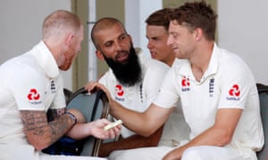 Ben Stokes, Moeen Ali and Jos Buttler (right) before play in the second Test against West Indies at North Sound in 2019.