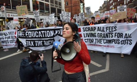 Students march through London to protest against tuition fees and student debt.