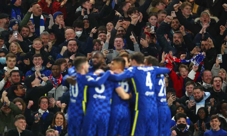 Chelsea fans and players celebrate in unison following Kai Havertz’s opener
