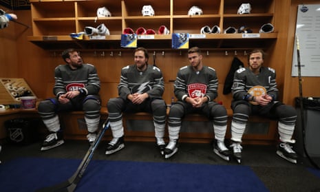 NHL players at the 2020 All-Star Game in St Louis sit in the locker room. The media and other personnel will not be allowed to enter locker rooms for the time being