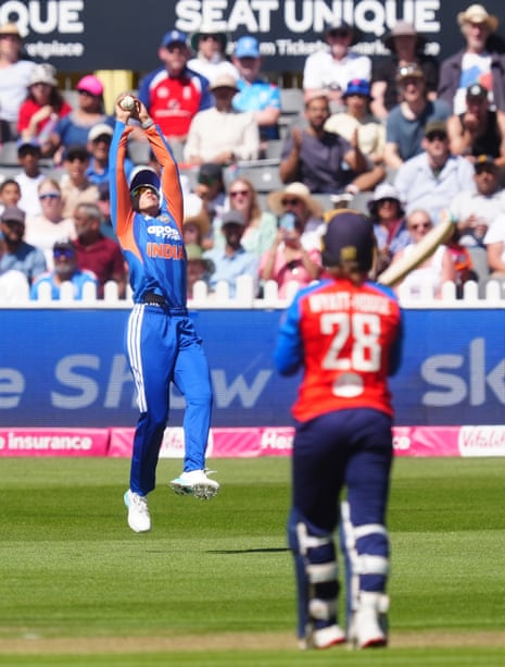 India's Smriti Mandhana catches out England's Danni Wyatt-Hodge.