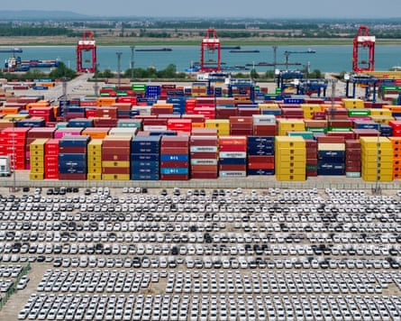 Chinese made cars, including Volvo and other brands, parked at the port in Nanjing, China.