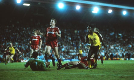 It’s up for grabs now: Michael Thomas wheels away after scoring the improbable injury-time goal that saw Arsenal win 2-0 at Anfield, and take the title off Liverpool in 1989.