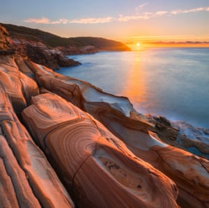 Sunrise over the tessellated pavement in Bouddi National Park.