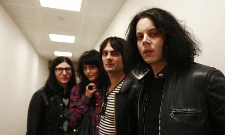 In 2009, with Dean Fertita, Alison Mosshart and Jack Lawrence in The Dead Weather.