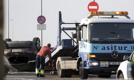 A flatbed truck removes the car suspected of being used in the terror attack in Cambrils.