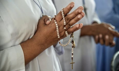A nun prays at a mass for the victims of the blast at St Sebastian’s church in Negombo, Sri Lanka
