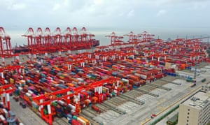 Stacks of containers in a container terminal at the Yangshan Deepwater Port in Shanghai, China.