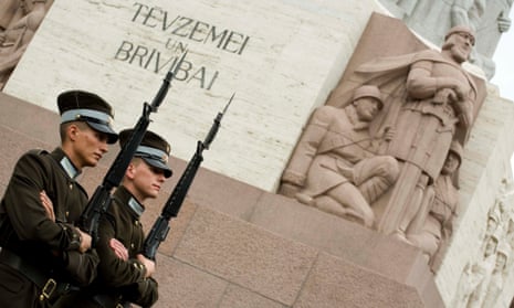 Guards in front of the freedom monument in Riga, Latvia