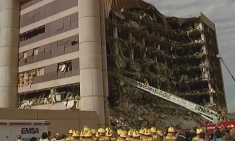 a large brown building partially collapsed on one side