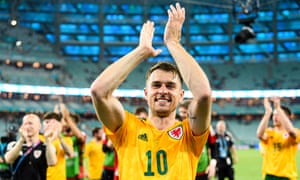 Aaron Ramsey of Wales celebrating with his supporters and teammates after winning against Turkey during the UEFA Euro 2020 Championship Group A match between Turkey and Wales on June 16, 2021 in Baku, Azerbaijan. (Photo by Marcio Machado/Getty Images)